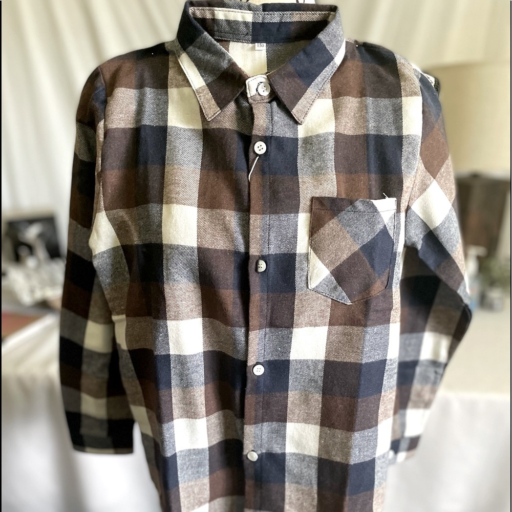 Boys size L. Plaid long sleeves. New with tag